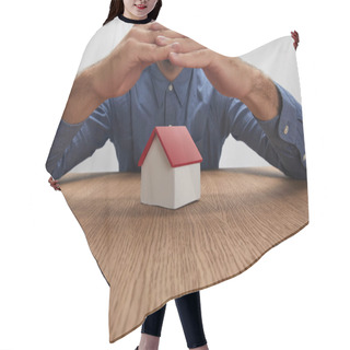 Personality  Cropped Shot Of Man Holding Hands Above House Model, Insurance Concept Hair Cutting Cape