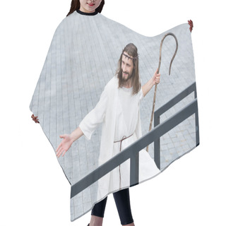 Personality  High Angle View Of Cheerful Jesus In Robe And Crown Of Thorns Walking On Stairs With Staff And Showing Hand Hair Cutting Cape