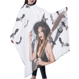 Personality  Girl In Black Witch Halloween Costume With Broom Near White Wall With Decorative Bats Hair Cutting Cape