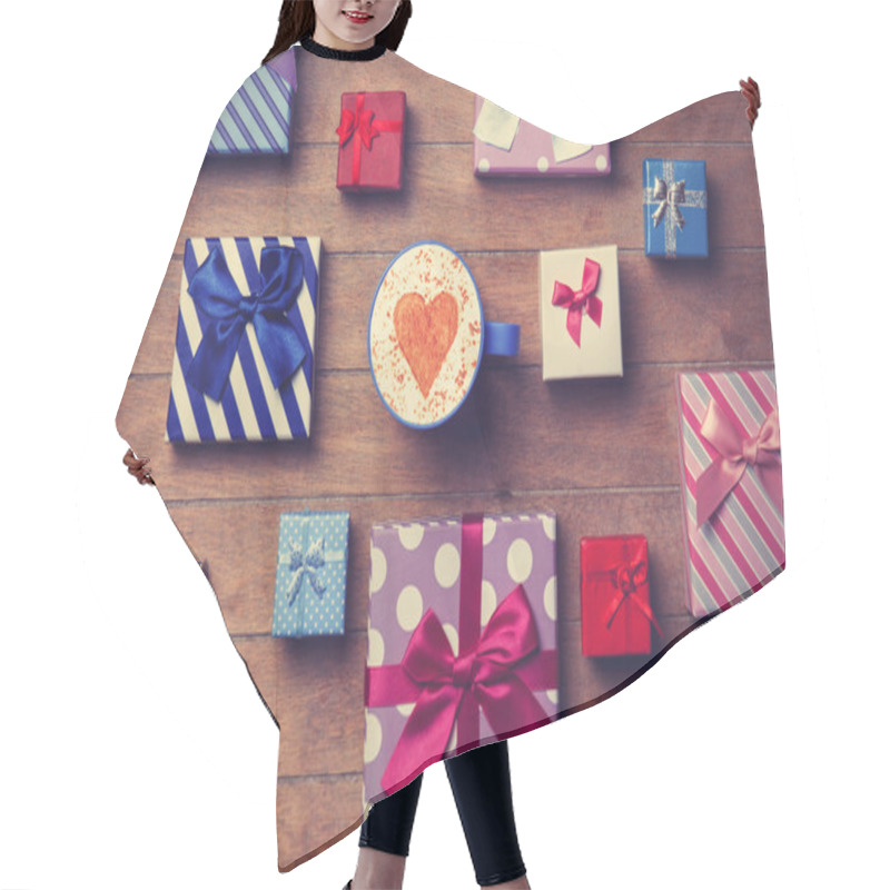 Personality  Cup and gift boxes on wooden background hair cutting cape