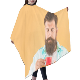 Personality  Portrait Of Man Smelling Tea With Closed Eyes Holding Cup And Saucer Yellow Background, Copy Space. Hair Cutting Cape