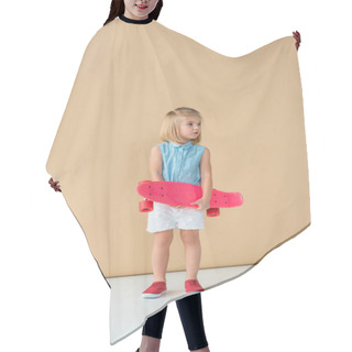 Personality  Cute Kid In Shirt And Shorts Holding Pink Penny Board On Beige Background  Hair Cutting Cape