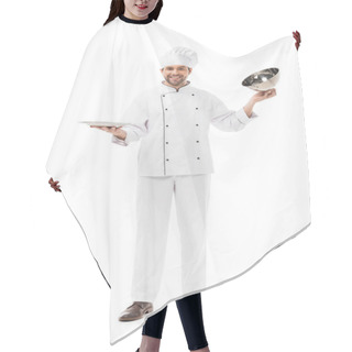 Personality  Smiling Young Chef Taking Of Serving Dome From Plate And Looking At Camera Isolated On White Hair Cutting Cape