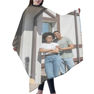 Personality  Smiling African American Man Hugging Girlfriend Near Acoustic Guitar And Boxes Near New House Hair Cutting Cape