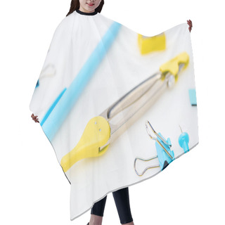 Personality  Selective Focus Of Yellow And Blue Stationery With Paper Clips, Compasses, Pencil Sharpener And Pen On White Background Hair Cutting Cape
