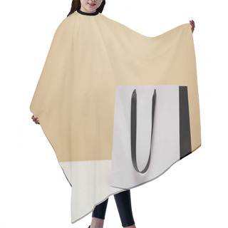 Personality  One White Shopping Bag With Black Handle On White Table Isolated On Beige Hair Cutting Cape