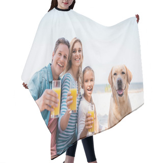 Personality  Selective Focus Of Family Looking At Camera While Holding Glasses Of Orange Juice Near Golden Retriever On Beach  Hair Cutting Cape