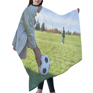 Personality  African American Woman With Soccer Ball, Mother Looking At Son, Blurred Background, Green Field Hair Cutting Cape