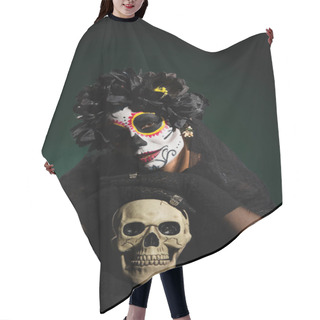 Personality  Woman In Mexican Halloween Costume Touching Skull On Dark Green Background  Hair Cutting Cape