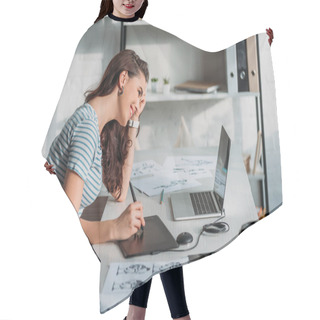 Personality  Side View Of Happy Animator Using Digital Tablet Near Sketches  Hair Cutting Cape