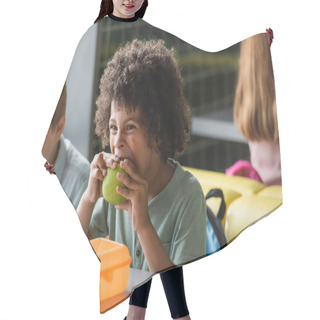 Personality  African American Schoolboy Eating Apple Near Blurred Classmates In School Canteen Hair Cutting Cape