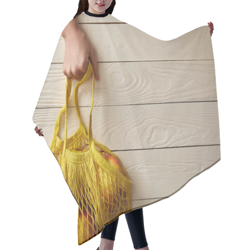 Personality  Cropped View Of Female Hand With String Bag Full Of Rape Apples On White Wooden Surface, Zero Waste Concept Hair Cutting Cape