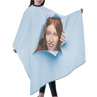 Personality  Amazed Redhead Young Woman Looking Away On Blue Ripped Background Hair Cutting Cape