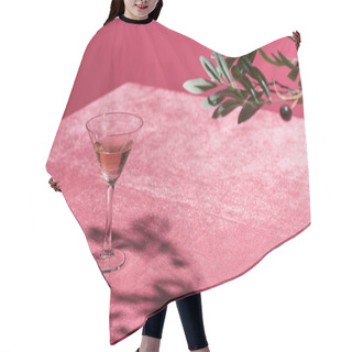 Personality  Selective Focus Of Olive Tree Branch Near Rose Wine In Glass On Velour Pink Cloth Isolated On Pink, Girlish Concept Hair Cutting Cape