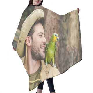 Personality  Handsome Young Man With Parrot On Shoulder In Jungle Hair Cutting Cape