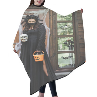 Personality  Woman In Black Halloween Costume Holding Spooky Skull And Bucket With Sweets On House Porch Hair Cutting Cape
