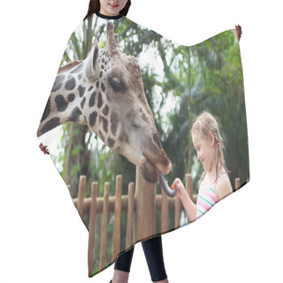 Personality  Family Feeding Giraffe In Zoo. Children Feed Giraffes In Tropical Safari Park During Summer Vacation. Kids Watch Animals. Little Girl Giving Fruit To Wild Animal. Hair Cutting Cape
