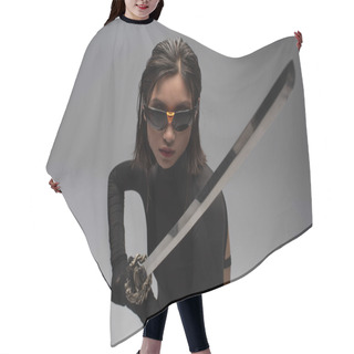 Personality  Dangerous Asian Woman In Sunglasses And Black Outfit Holding Katana Isolated On Grey Hair Cutting Cape