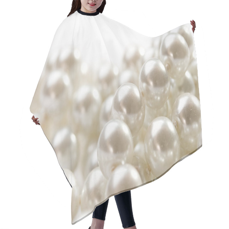 Personality  Pearl on white hair cutting cape