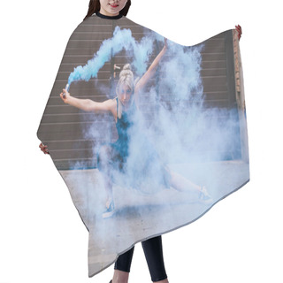 Personality  Young Contemporary Dancer Looking At Camera And Dancing In Blue Smoke On Street  Hair Cutting Cape