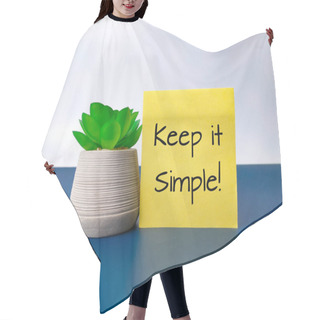 Personality  Green Plant And Sticky Note With The Word Keep It Simple. Business Concept. Hair Cutting Cape