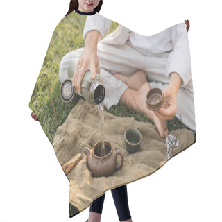 Personality  Partial View Of Yoga Man Pouring Hot Water In Clay Teapot While Sitting On Lawn Near Linen Rug With Mala Beads And Palo Santo Stick Hair Cutting Cape