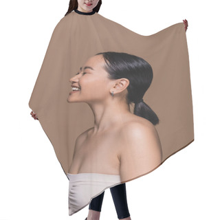 Personality  Young Asian Woman In Top And With Ponytail Hairstyle Standing Isolated On Brown  Hair Cutting Cape