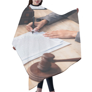 Personality  Selective Focus Of Judge Signing Insurance Policy Document In Office Hair Cutting Cape