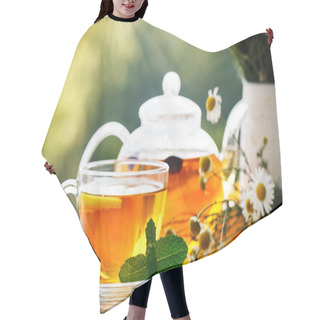 Personality  Cup With Hot Tea With Mint And A Thyme On A Wooden Table In A Summer Garden. Hair Cutting Cape