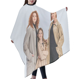 Personality  Three Generation Joyful Family Standing Together In Stylish Coats On Grey Backdrop, Autumn Fashion Hair Cutting Cape