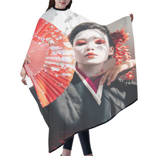 Personality  Portrait Of Beautiful Geisha With Red And White Makeup Holding Hand Fan And Gesturing In Sunlight Hair Cutting Cape