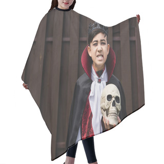 Personality  Asian Boy In Vampire King Costume Growling While Holding Skull And Looking At Camera Hair Cutting Cape