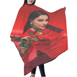 Personality  Pretty Brunette Woman In Jacket Holding Rose And Looking At Camera On Red Background  Hair Cutting Cape