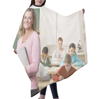 Personality  Teacher Standing With Notebook In Classroom Hair Cutting Cape