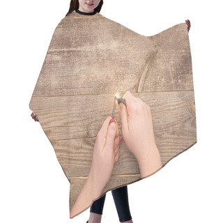 Personality  Partial View Of Man Lighting Spark On Wooden Table Hair Cutting Cape
