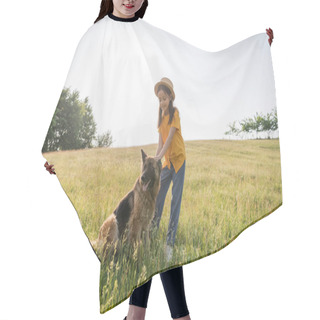 Personality  Girl In Straw Hat Stroking Fluffy Cattle Dog In Grassy Pasture On Summer Day Hair Cutting Cape