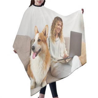 Personality  Cute Corgi Dog Sitting On Couch Near Happy Curly Woman Using Laptop While Working From Home Hair Cutting Cape
