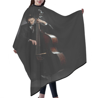Personality  Professional Male Musician Playing On Contrabass On Dark Stage Hair Cutting Cape