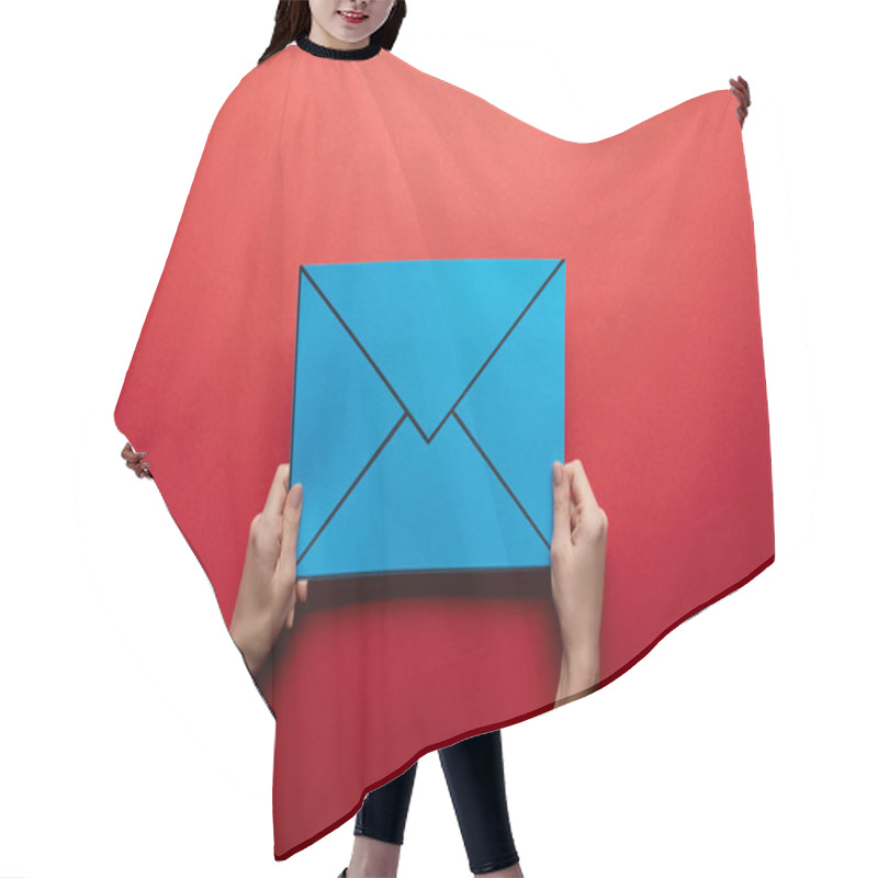 Personality  top view of blue mail sign on red background hair cutting cape