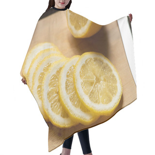 Personality  Close Up View Of Sliced Lemon On Wooden Cutting Board With Knife Hair Cutting Cape