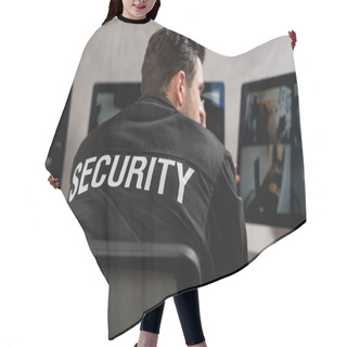 Personality  Rear View Of Guard In Black Uniform Looking At Computer Monitor  Hair Cutting Cape