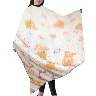 Personality  Baby Swaddling With Bears And Hearts. Heap Of Folded Linen Of Various Colors. Pile Of The Washed And Ironed Linen. Hair Cutting Cape
