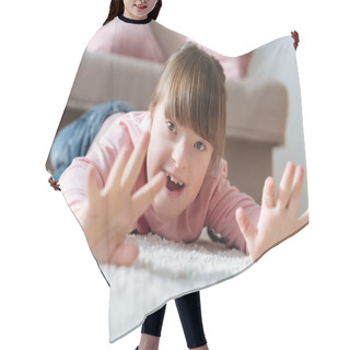 Personality  Happy Child With Down Syndrome Lying On Floor In Cozy Room Hair Cutting Cape