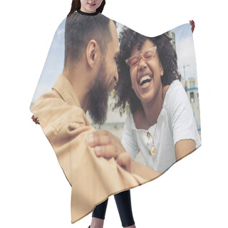 Personality  Happy Young Multiethnic Couple Having Fun And Laughing On Street  Hair Cutting Cape