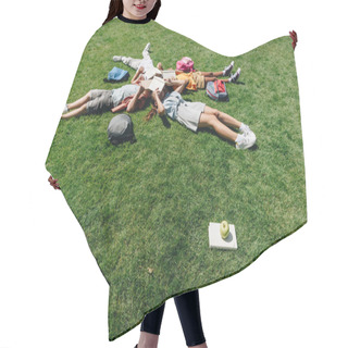 Personality  Four Multicultural Schoolkids Lying On Lawn And Covering Faces With Books Hair Cutting Cape
