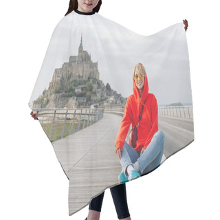 Personality  Happy Young Woman Smiling At Camera While Sitting Near Mont Saint Michel, France  Hair Cutting Cape