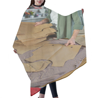 Personality  Cropped View Of Artisan Holding Sewing Patterns Near Fabric On Table While Working In Blurred Print Studio, Multitasking Business Owner Managing Multiple Project Hair Cutting Cape