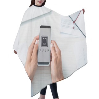 Personality  Top View Of Man Holding Smartphone With Uber Website Hair Cutting Cape