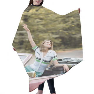Personality  Smiling Woman Looking Away While Sitting In Convertible Car With Hand In Air Hair Cutting Cape