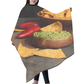 Personality  Close Up View Of Mexican Nachos With Fresh Guacamole And Chili Peppers On Stone Table Isolated On Black Hair Cutting Cape